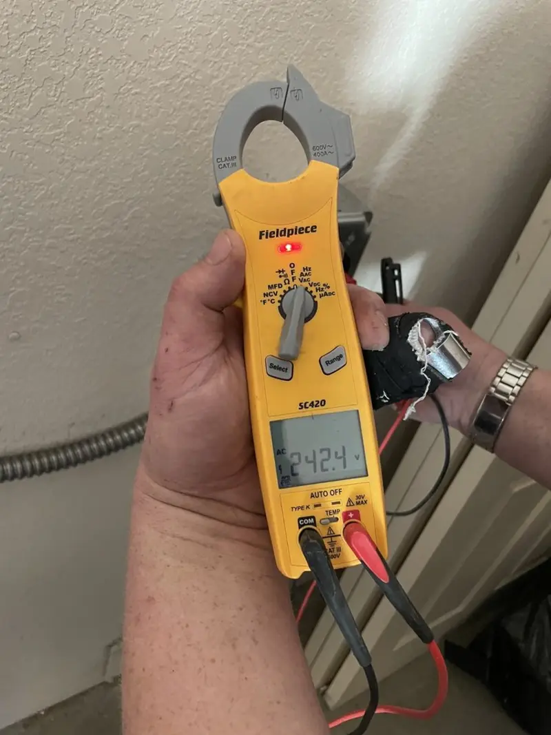 Voltage testing with clamp meter during Generator Installation in Maryville